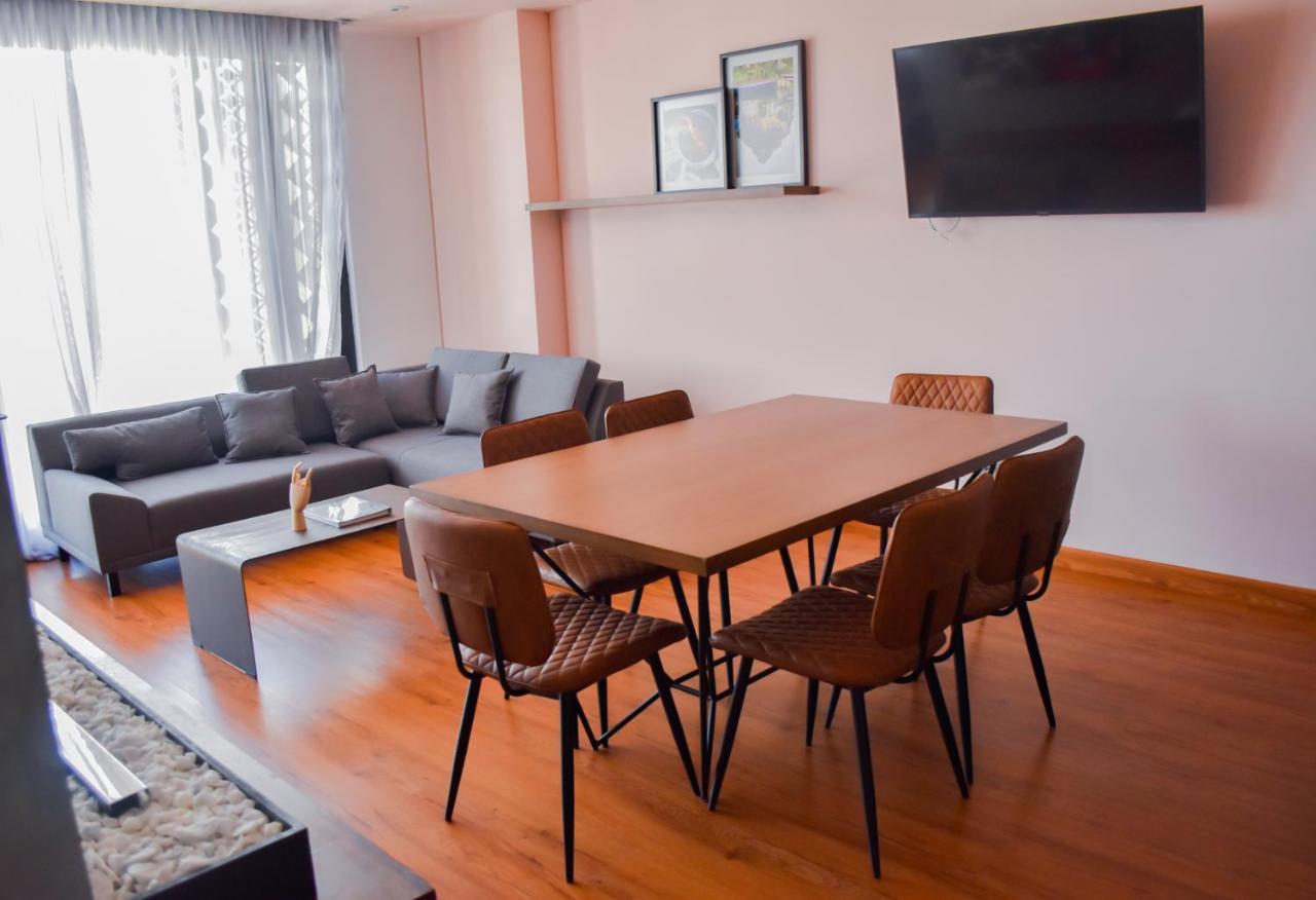 Hotel V1501 Pasto Buitenkant foto A living room in a typical apartment