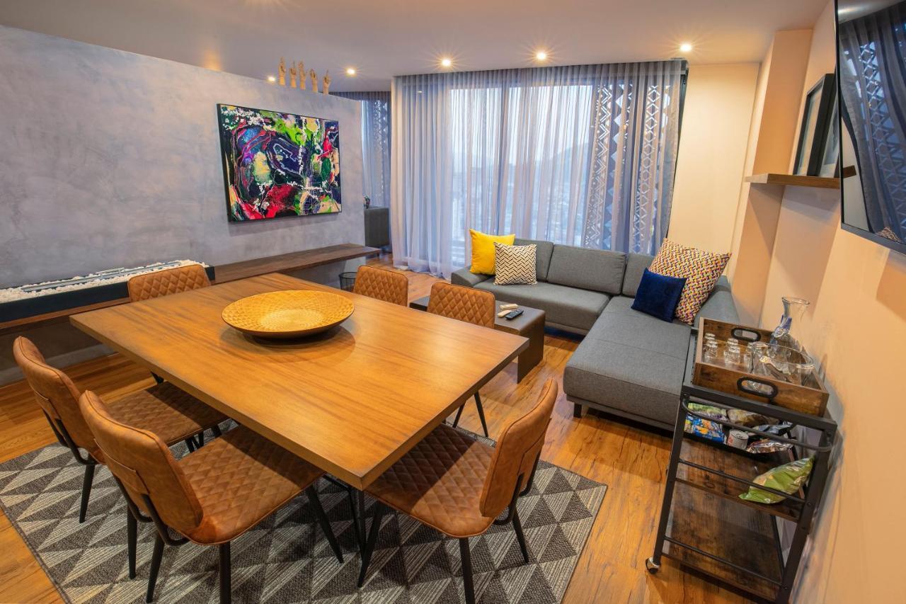 Hotel V1501 Pasto Buitenkant foto A living room in a condominium