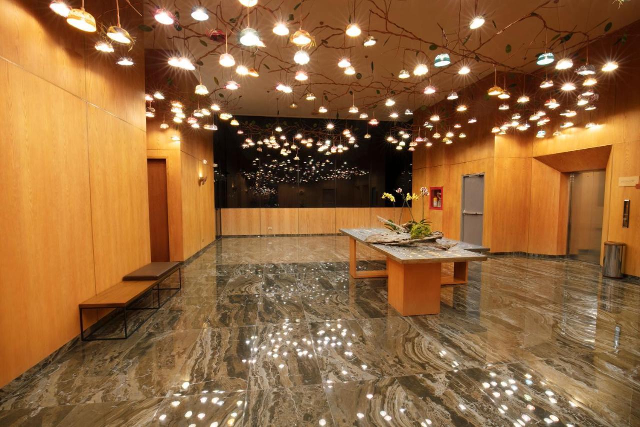 Hotel V1501 Pasto Buitenkant foto The lobby of the National Museum of Singapore